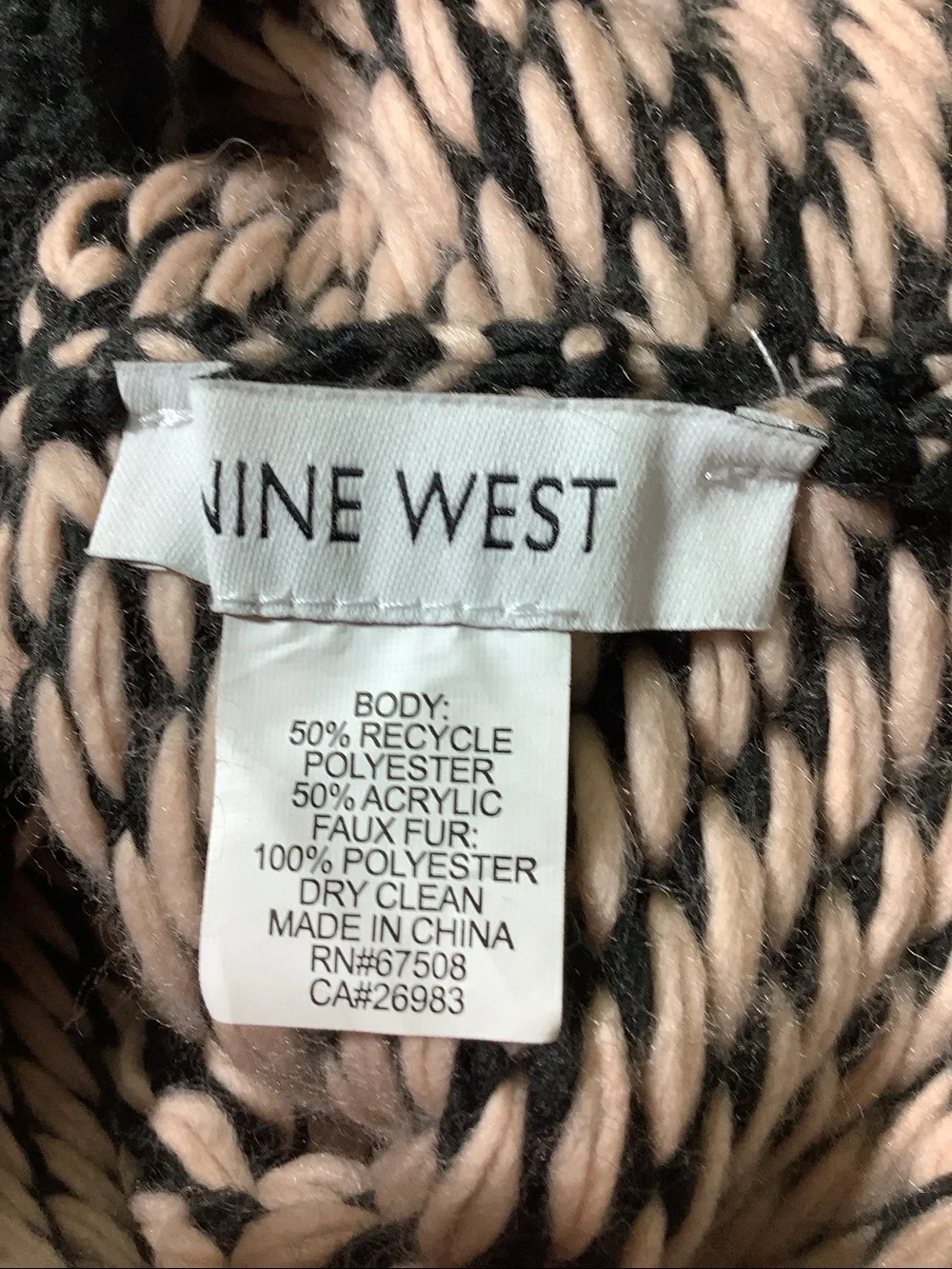 Nine West black beanie with pale pink heart accents